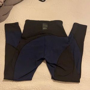 RARE Lululemon legging in perfect condition. Navy and black detailing